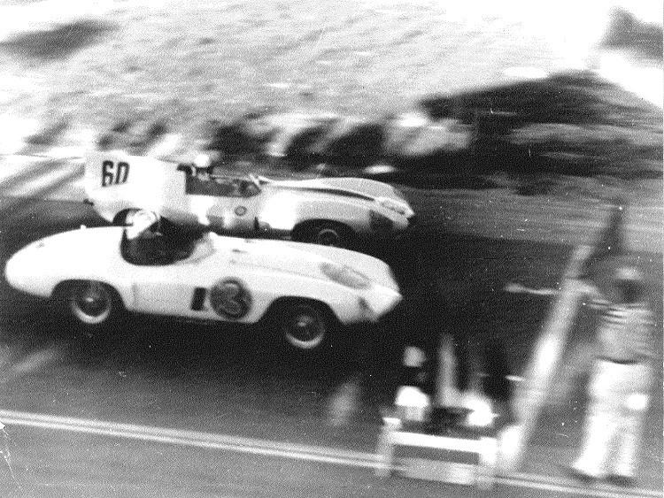 Two racecars finishing the first race in 1955